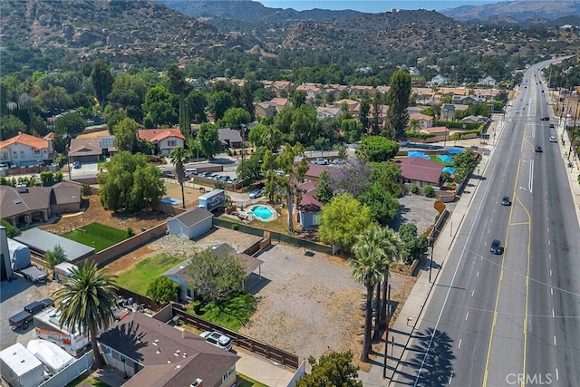 10555 Topanga Canyon Blvd, Chatsworth, CA 91311 - aerial view of residential area with a mountain backdrop