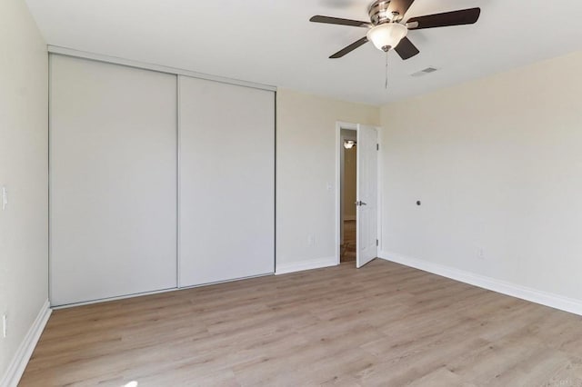 1230 Ramona Ave, Spring Valley, CA 91977 - unfurnished bedroom with a closet, light wood-style flooring, and ceiling fan