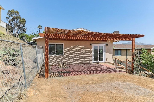 1230 Ramona Ave, Spring Valley, CA 91977 - rear view of house featuring a pergola and stucco siding