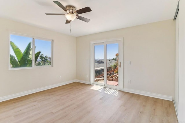 1230 Ramona Ave, Spring Valley, CA 91977 - spare room featuring healthy amount of natural light, light wood-style floors, and ceiling fan