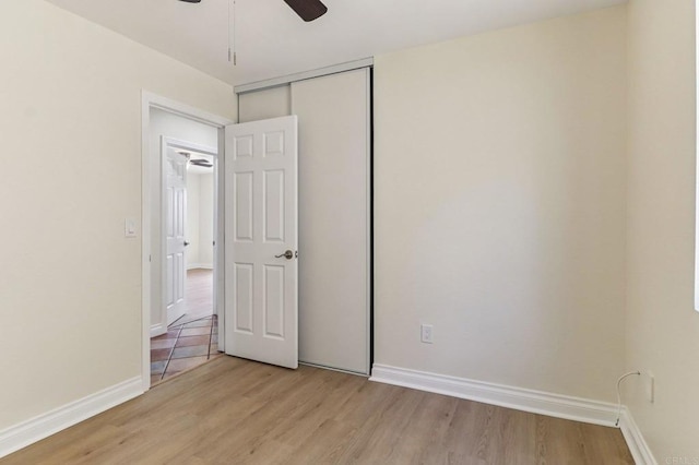 1230 Ramona Ave, Spring Valley, CA 91977 - unfurnished bedroom with light wood-type flooring, a closet, and ceiling fan