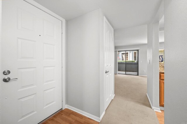15032 Avenida Venusto Unit 179, San Diego, CA 92128 - corridor featuring baseboards