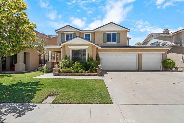 24058 Via Vis, Valencia, CA 91354 - view of front of property with stucco siding, concrete driveway, a front yard, and an attached garage