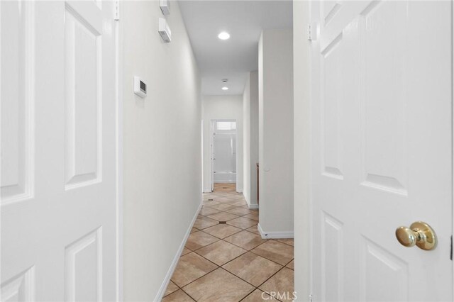 24058 Via Vis, Valencia, CA 91354 - hallway featuring light tile patterned flooring and recessed lighting
