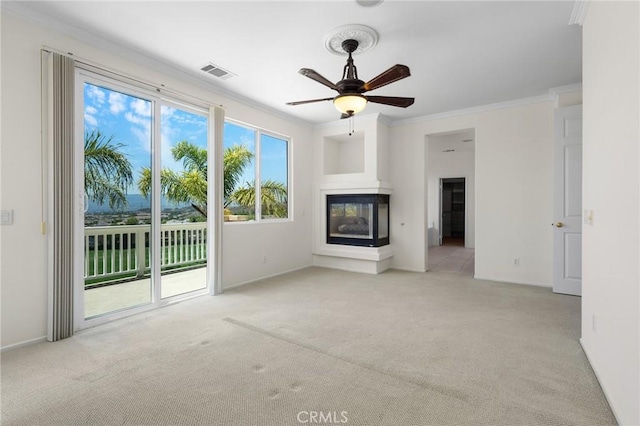 24058 Via Vis, Valencia, CA 91354 - unfurnished living room featuring carpet flooring, a multi sided fireplace, crown molding, and ceiling fan
