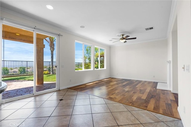 24058 Via Vis, Valencia, CA 91354 - spare room with crown molding, wood finished floors, ceiling fan, and recessed lighting