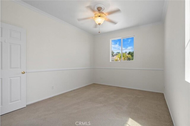 24058 Via Vis, Valencia, CA 91354 - carpeted spare room with a ceiling fan and crown molding