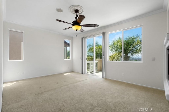 24058 Via Vis, Valencia, CA 91354 - carpeted empty room featuring crown molding and ceiling fan
