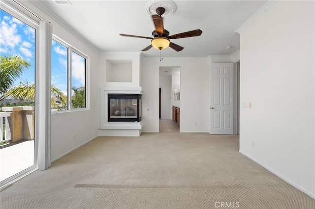 24058 Via Vis, Valencia, CA 91354 - unfurnished living room featuring light colored carpet, a multi sided fireplace, a ceiling fan, and crown molding
