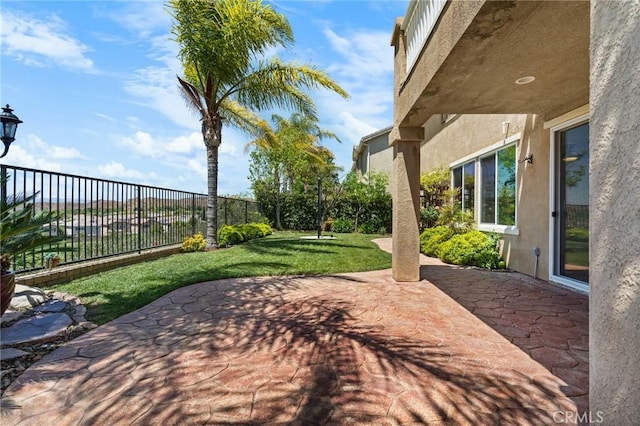 24058 Via Vis, Valencia, CA 91354 - fenced backyard featuring a patio area