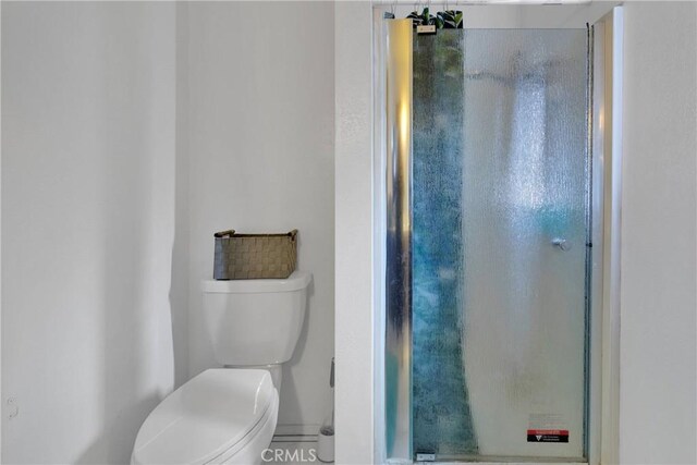 8960 Buckthorn Ave, Hesperia, CA 92345 - full bathroom with a stall shower and toilet