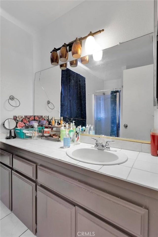 8960 Buckthorn Ave, Hesperia, CA 92345 - bathroom featuring a shower stall and vanity