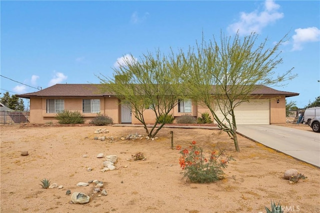 8960 Buckthorn Ave, Hesperia, CA 92345 - ranch-style home featuring stucco siding, concrete driveway, and an attached garage