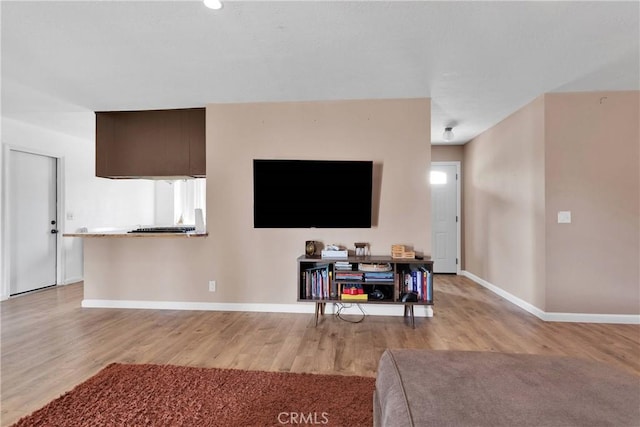 8960 Buckthorn Ave, Hesperia, CA 92345 - living room with light wood finished floors and baseboards