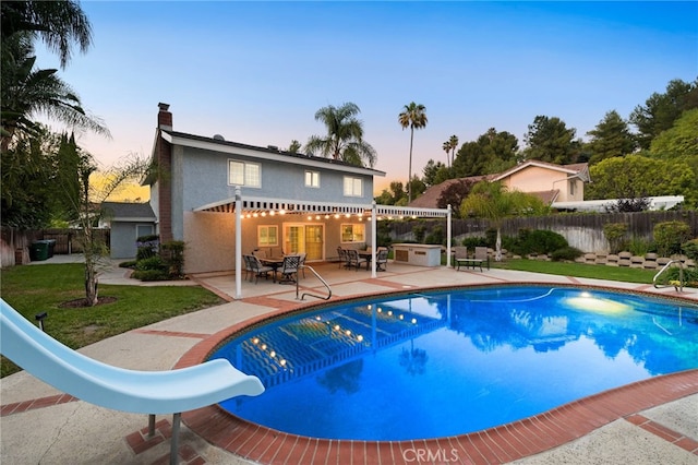 1722 Calle Alto, San Dimas, CA 91773 - view of pool with a water slide, a fenced backyard, and a patio area