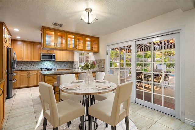 1722 Calle Alto, San Dimas, CA 91773 - dining room featuring light tile patterned floors, a textured ceiling, and recessed lighting