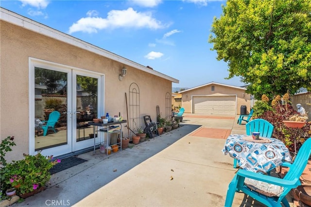 1117 Gladstone St, La Verne, CA 91750 - view of patio with french doors, an outdoor structure, and a detached garage