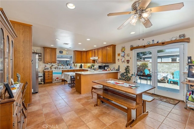 1117 Gladstone St, La Verne, CA 91750 - kitchen with dishwashing machine, a peninsula, recessed lighting, light countertops, and ceiling fan