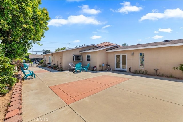 1117 Gladstone St, La Verne, CA 91750 - back of house with french doors, stucco siding, and a patio