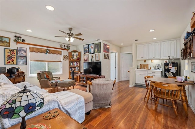 1117 Gladstone St, La Verne, CA 91750 - living room with wood finished floors, ceiling fan, and recessed lighting