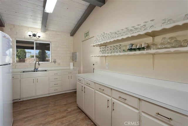 3331 Via Altamira, Fallbrook, CA 92028 - kitchen featuring open shelves, freestanding refrigerator, light countertops, light wood-style floors, and wood ceiling