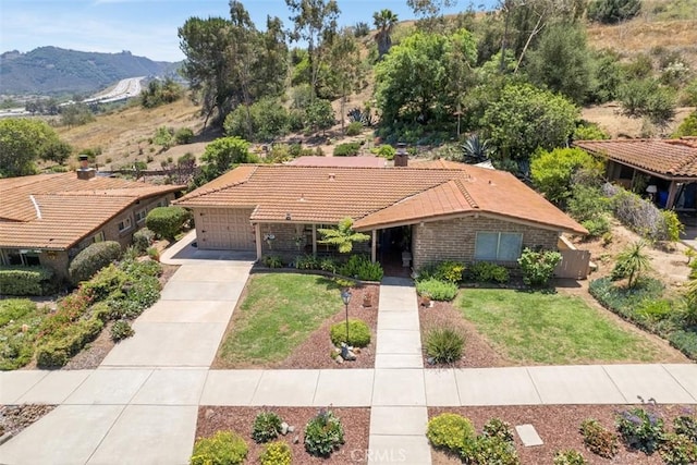 3331 Via Altamira, Fallbrook, CA 92028 - view of front of home featuring a tile roof, driveway, a front yard, and a mountain view