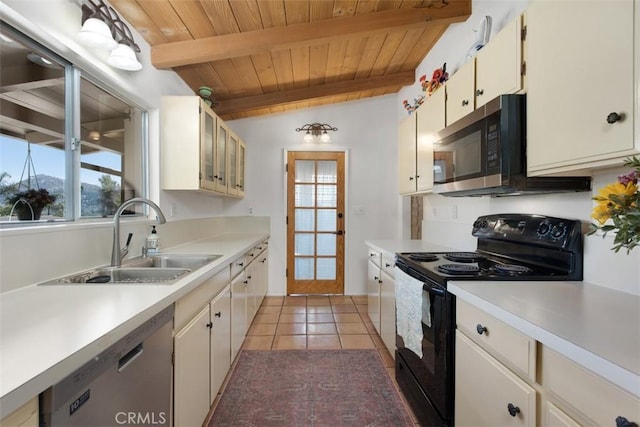 3331 Via Altamira, Fallbrook, CA 92028 - kitchen featuring appliances with stainless steel finishes, wood ceiling, healthy amount of natural light, light countertops, and light tile patterned flooring