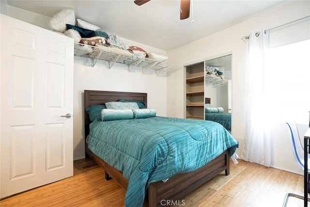 3432 Larissa Dr, Los Angeles, CA 90026 - bedroom with light wood-style floors and ceiling fan