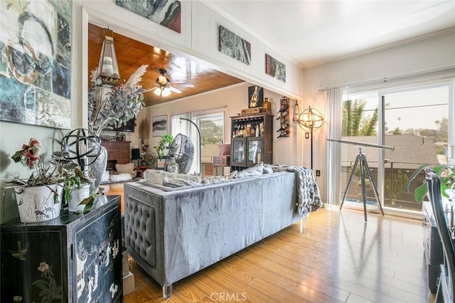 3432 Larissa Dr, Los Angeles, CA 90026 - living room with wood finished floors, ornamental molding, and a ceiling fan