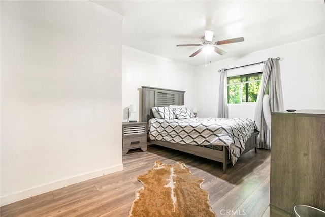 3432 Larissa Dr, Los Angeles, CA 90026 - bedroom featuring wood finished floors and ceiling fan
