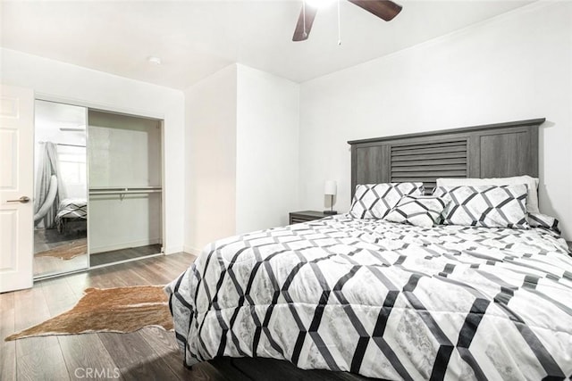 3432 Larissa Dr, Los Angeles, CA 90026 - bedroom with wood finished floors, ceiling fan, and a closet