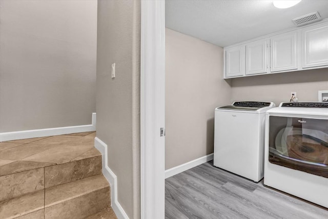 13325 Via Tresca Unit 7, San Diego, CA 92129 - laundry area featuring washer and clothes dryer and cabinet space