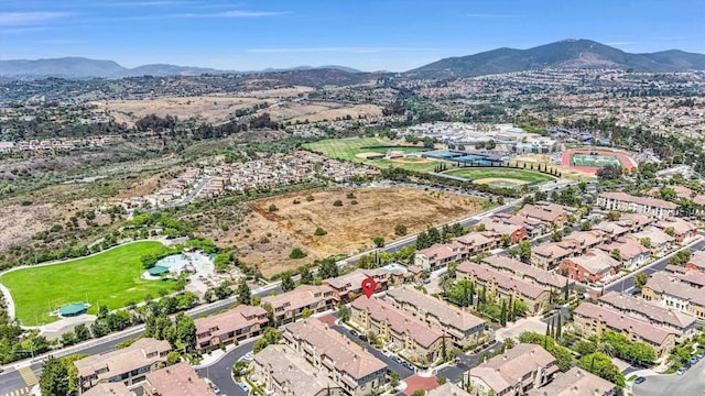 13325 Via Tresca Unit 7, San Diego, CA 92129 - aerial overview of property's location with a mountainous background and nearby suburban area