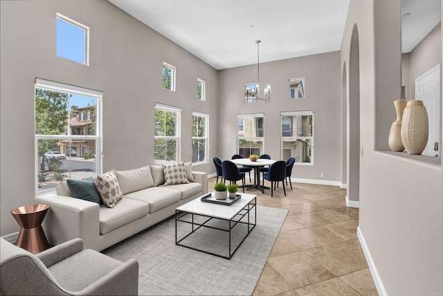 13325 Via Tresca Unit 7, San Diego, CA 92129 - living area with a chandelier and a high ceiling