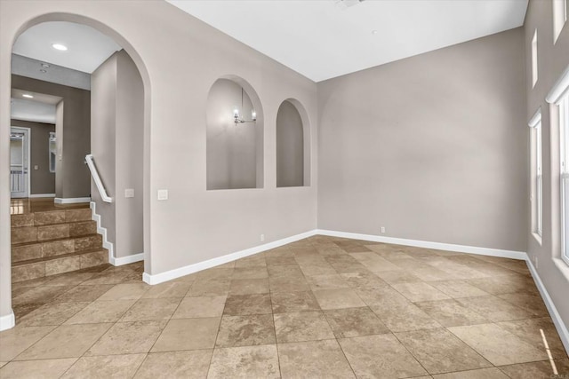 13325 Via Tresca Unit 7, San Diego, CA 92129 - spare room with stairway and recessed lighting