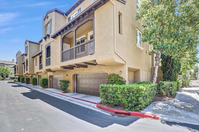 13325 Via Tresca Unit 7, San Diego, CA 92129 - view of property with a garage