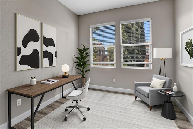13325 Via Tresca Unit 7, San Diego, CA 92129 - home office featuring wood finished floors and baseboards