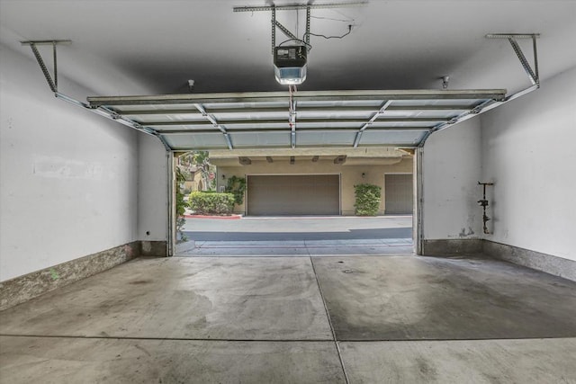 13325 Via Tresca Unit 7, San Diego, CA 92129 - garage featuring a garage door opener
