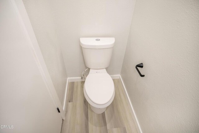 1925 Ginger St Unit 112, Oxnard, CA 93036 - bathroom featuring toilet and wood finished floors