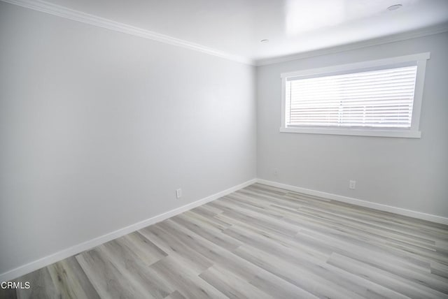 1925 Ginger St Unit 112, Oxnard, CA 93036 - empty room with light wood-style floors and crown molding