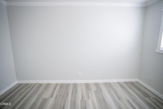 1925 Ginger St Unit 112, Oxnard, CA 93036 - unfurnished room featuring wood finished floors and ornamental molding