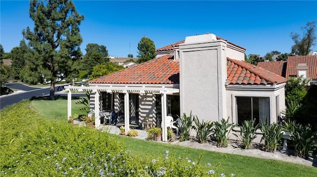 28432 Alava, Mission Viejo, CA 92692 - back of house with a yard, a tiled roof, and stucco siding