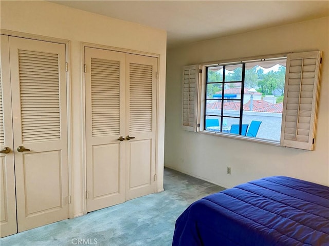 28432 Alava, Mission Viejo, CA 92692 - bedroom featuring light colored carpet and multiple closets