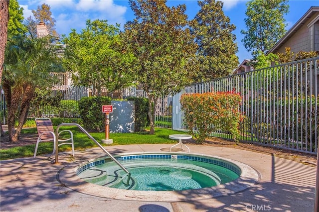 26701 Quail Crk Unit 31, Laguna Hills, CA 92656 - view of swimming pool with a community hot tub