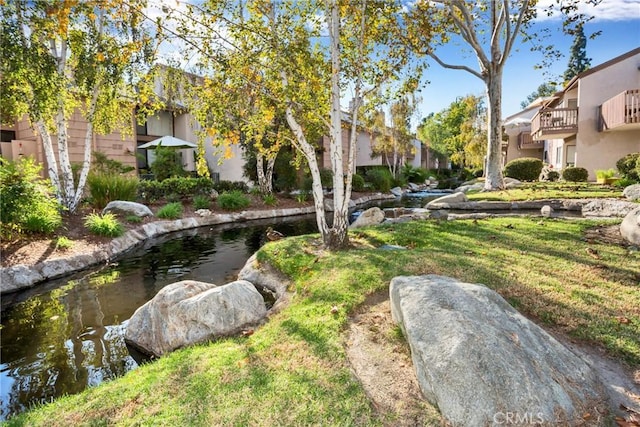 26701 Quail Crk Unit 31, Laguna Hills, CA 92656 - view of green lawn with a small pond and a residential view
