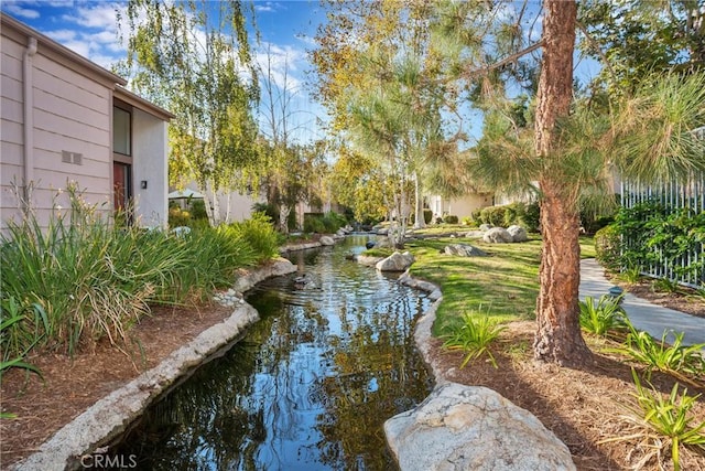 26701 Quail Crk Unit 31, Laguna Hills, CA 92656 - view of community featuring a garden pond