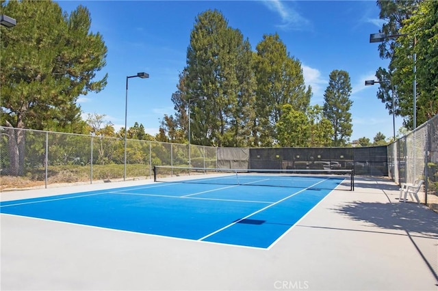 26701 Quail Crk Unit 31, Laguna Hills, CA 92656 - view of tennis court with community basketball court