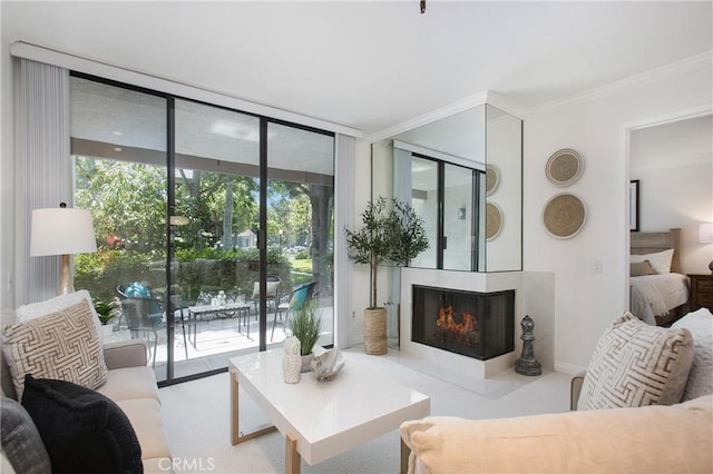 26701 Quail Crk Unit 31, Laguna Hills, CA 92656 - living room with a multi sided fireplace, crown molding, and expansive windows