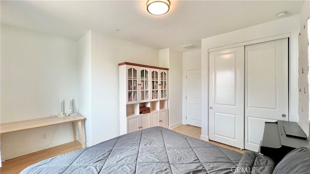 122 Espina, Irvine, CA 92620 - bedroom with wood finished floors and a closet