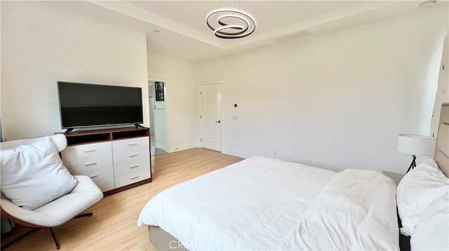 122 Espina, Irvine, CA 92620 - bedroom with light wood-style flooring